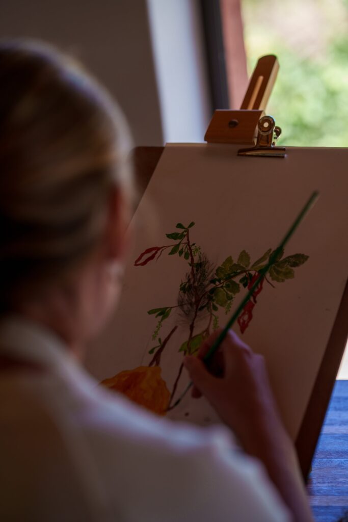 Painting flowers in our art studio
